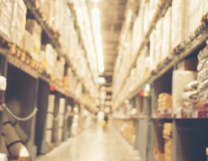 Abstract blurry background of warehouse storing with a lot of large box stack