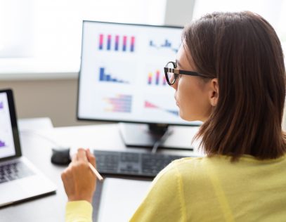 Caucasian advisor financial business analytics woman with data dashboard graphs